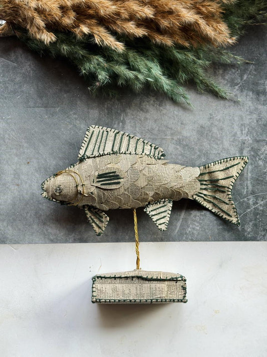 fish on stand with brass wire