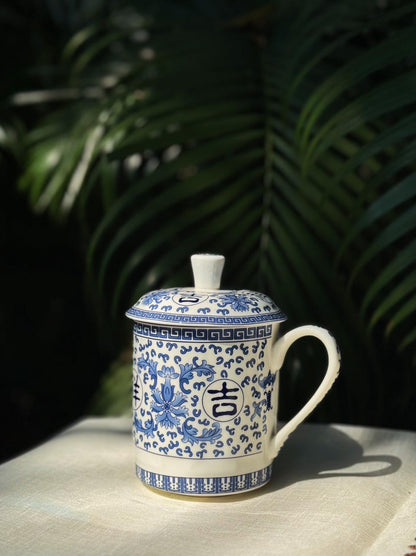 blue pottery mug with lid