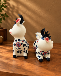 Whimsy & Chubby Ceramic Reindeer Pair With Floral Detail