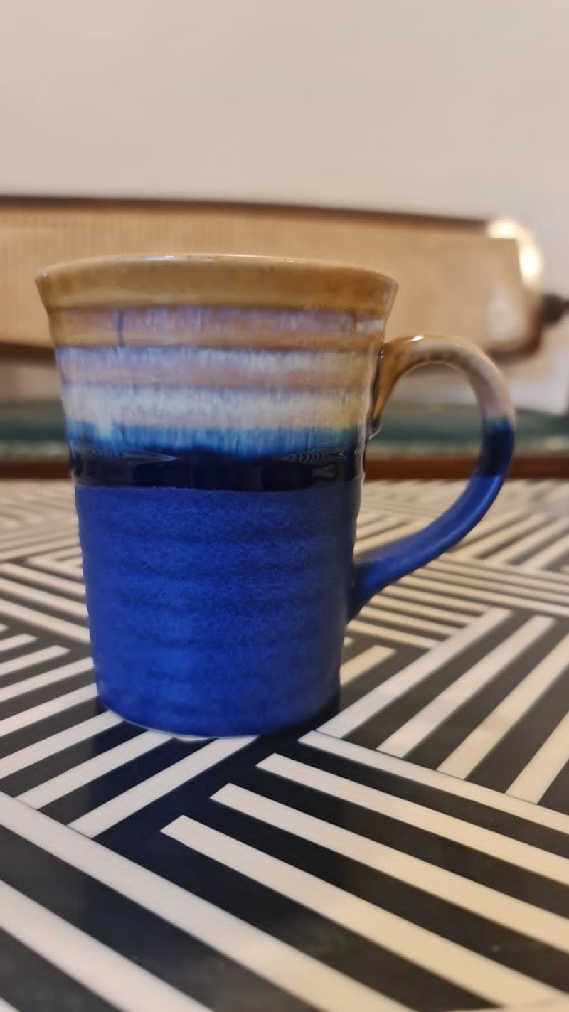 Yellow and blue mug by Ela