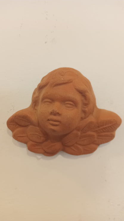 Small terracotta angel