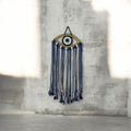 Macrame evil eye.