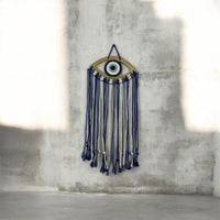 Macrame evil eye.