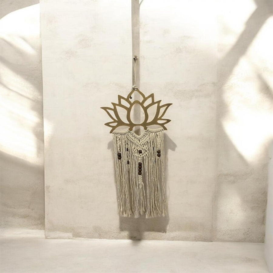 Gold lotus macrame wall hanging.