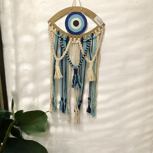 Macrame evil eye hanger.