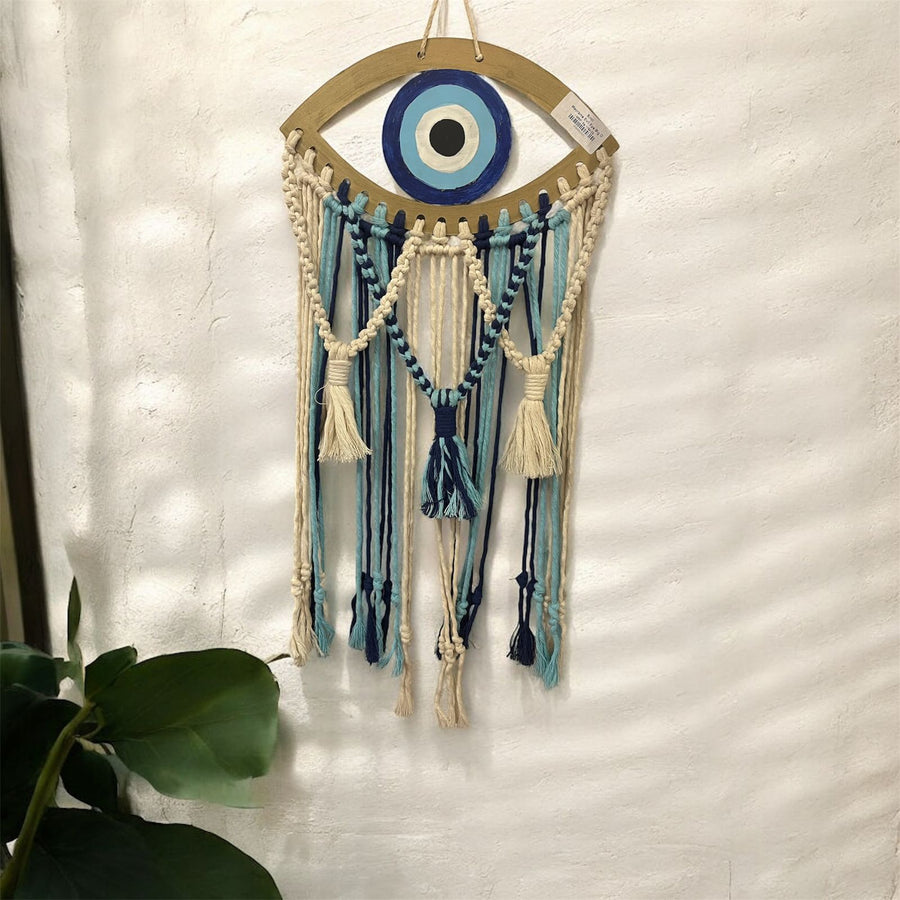Macrame evil eye hanger.