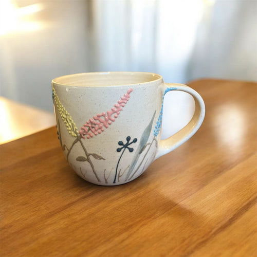 Hand-carved coffee mug.