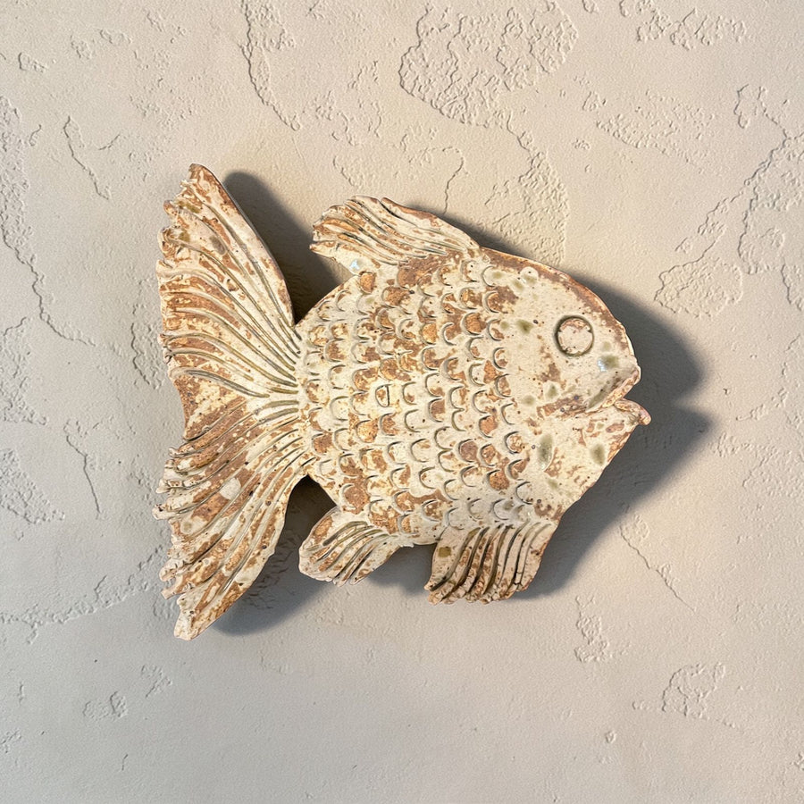 Ceramic fish wall art.
