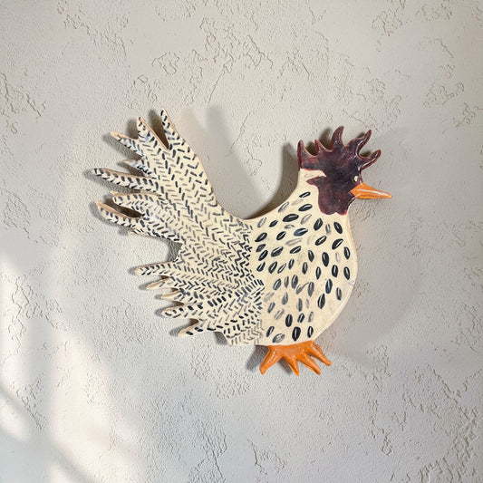 Ceramic rooster wall art.