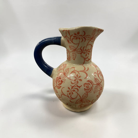 Floral vine ceramic pitcher