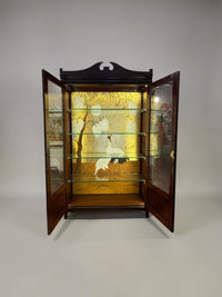 white flamingo painting glass cupboard
