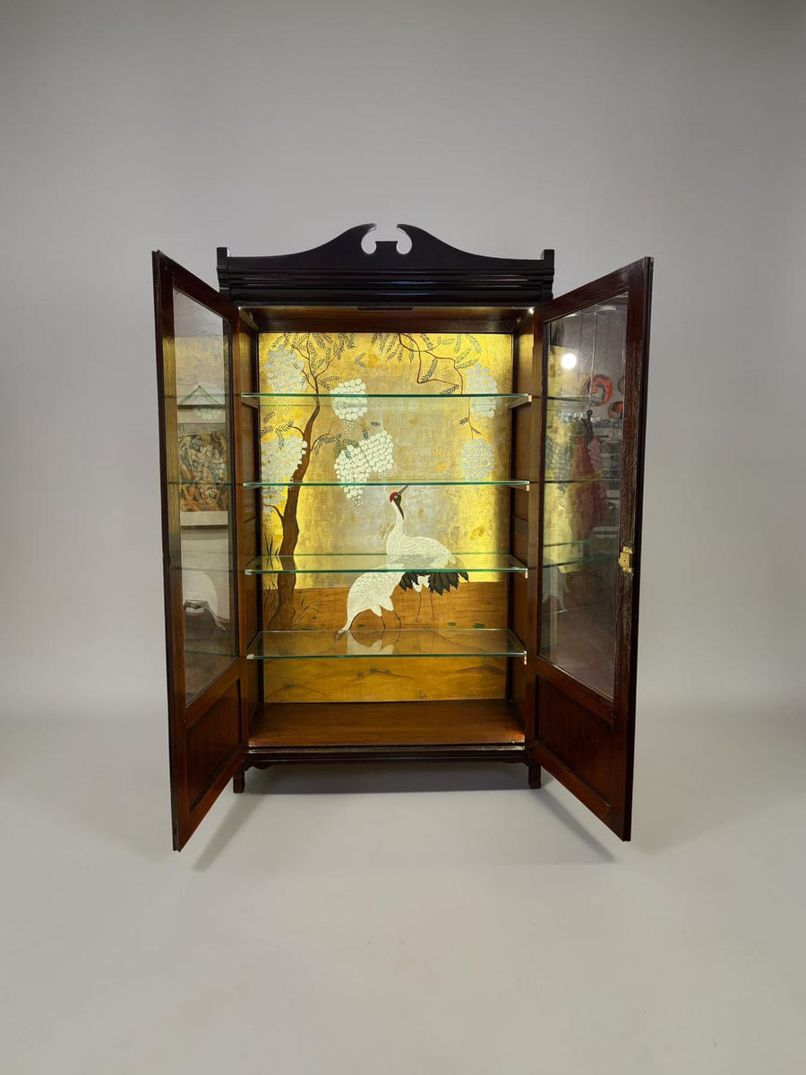 white flamingo painting glass cupboard