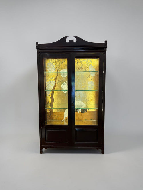 white flamingo painting glass cupboard
