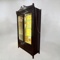 white flamingo painting glass cupboard